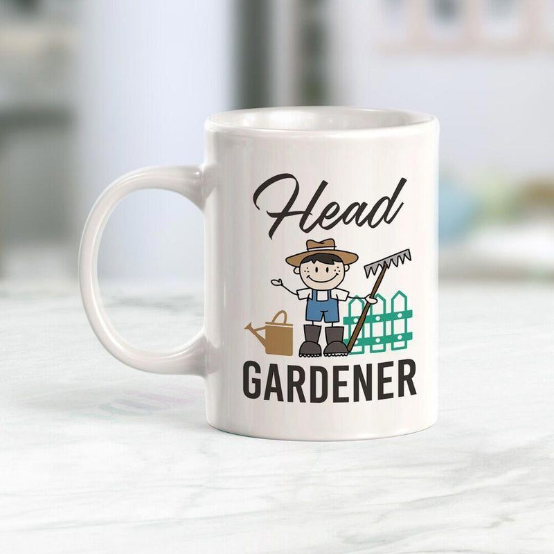 Tailorly White Ceramic 11 oz Mug - Head Gardener Friendly Cartoon Character Holding Rake Near Watering Can And Fence Gardener