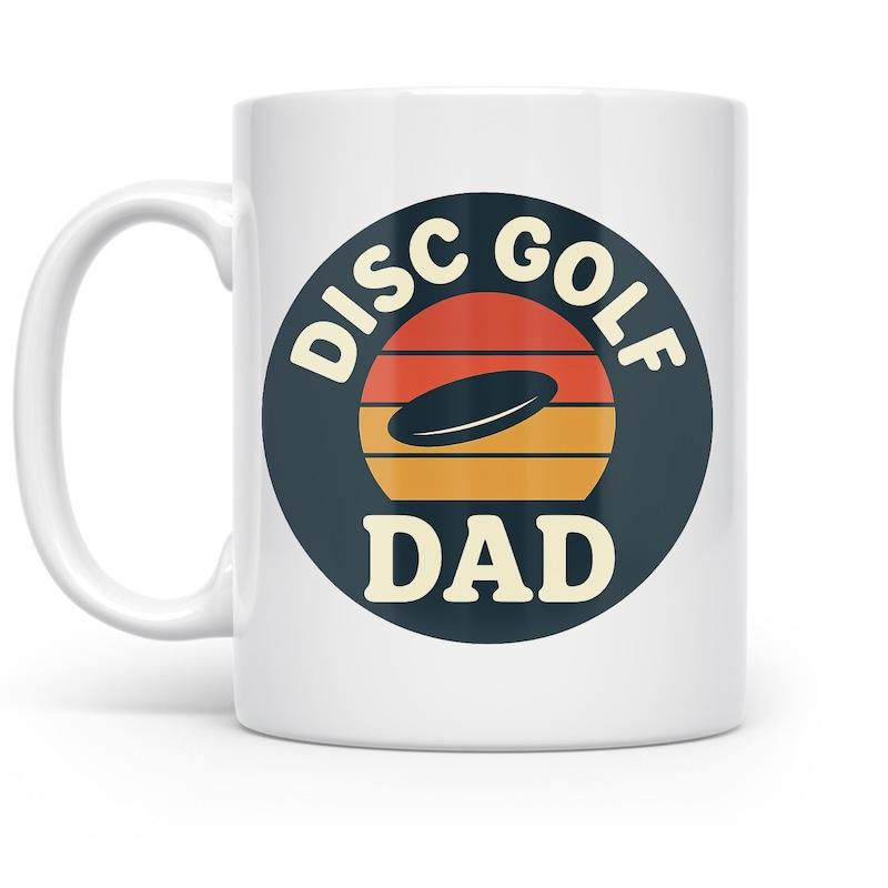 Tailorly White Ceramic 11 oz Mug - Disc Golf Dad Retro Sunset Background Featuring Flying Disc In Motion Disc