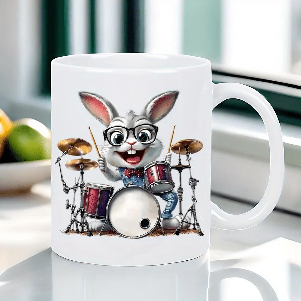 Tailorly White Ceramic 11 oz Mug - Joyful Animated Character Wearing Glasses Playing A Full Percussion Set Rabbit