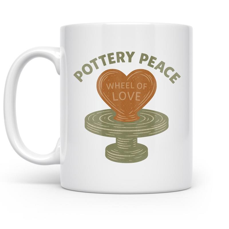Tailorly White Ceramic 11 oz Mug - Pottery Peace Wheel Of Love Vintage Green Pottery Wheel Holding A Textured Brown Clay Heart Design Pottery Wheel