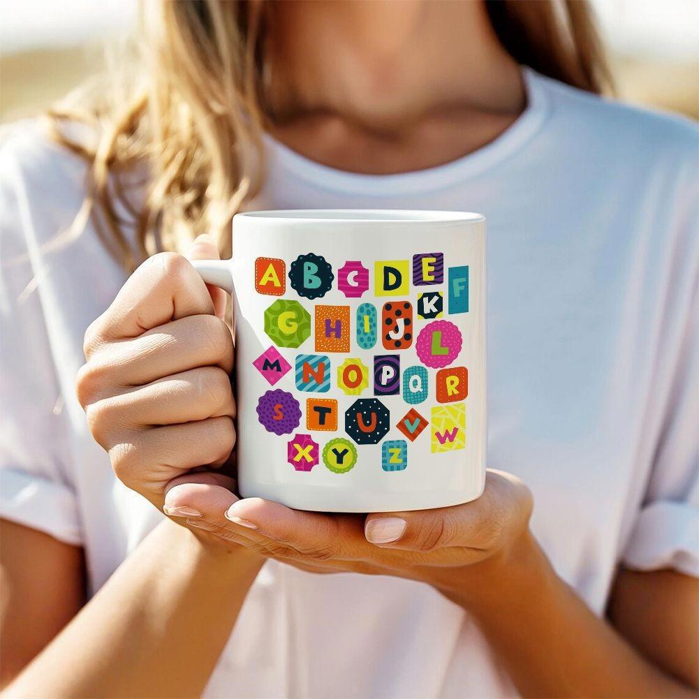 Tailorly White Ceramic 11 oz Mug - A B C D E F G H I J K L M N O P Q R S T U V W X Y Z Playful Colorful Educational Letters Scattered Across A Smooth Ceramic