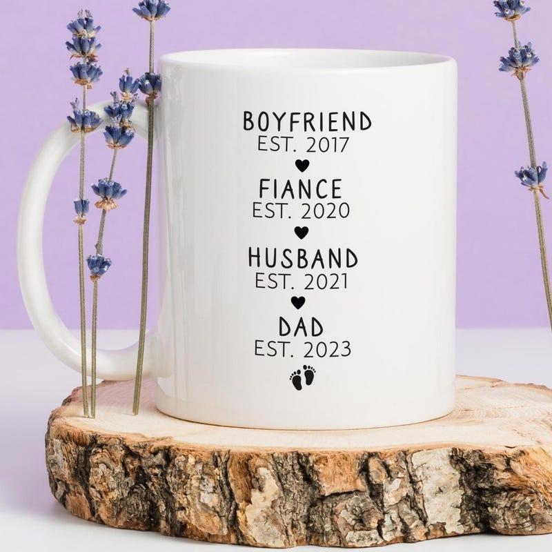 Tailorly White Ceramic 11 oz Mug - Boyfriend Fiance Husband Dad Est Minimalist Black Typography With Tiny Hearts And Small Footprints Mug
