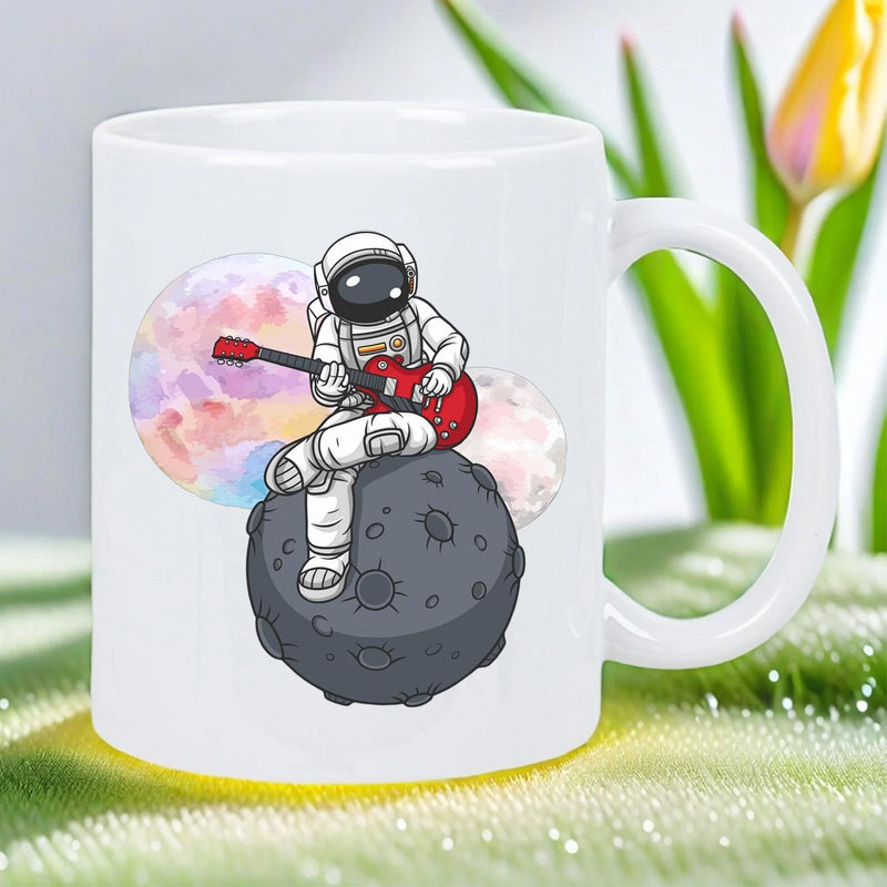 Tailorly White Ceramic 11 oz Mug - Whimsical Space Explorer Playing A Red Electric Guitar On Cratered Moon Astronaut