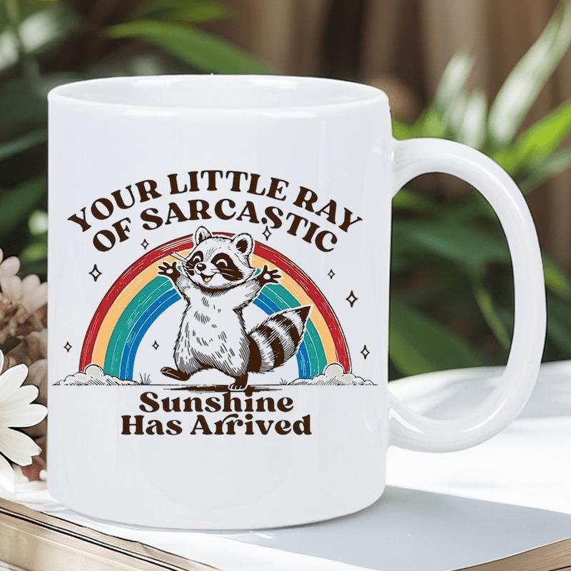 Tailorly White Ceramic 11 oz Mug - Your Little Ray Of Sarcastic Sunshine Has Arrived Happy Cartoon Character Standing Joyfully Before A Colorful Vibrant Rainbow