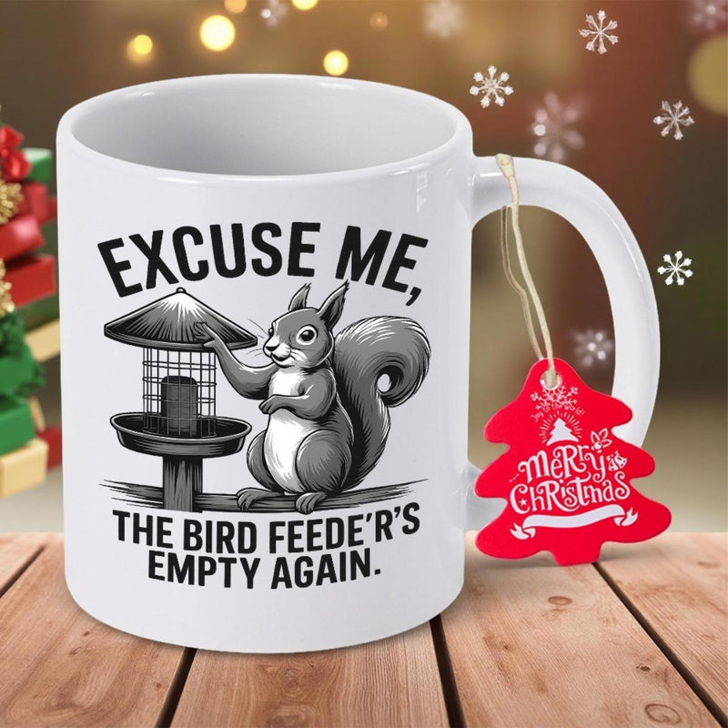 Tailorly White Ceramic 11 oz Mug - Excuse Me The Bird Feeders Empty Again Funny Gray Squirrel Pointing Towards An Empty Classic Wooden Bird Feeder Squirrel