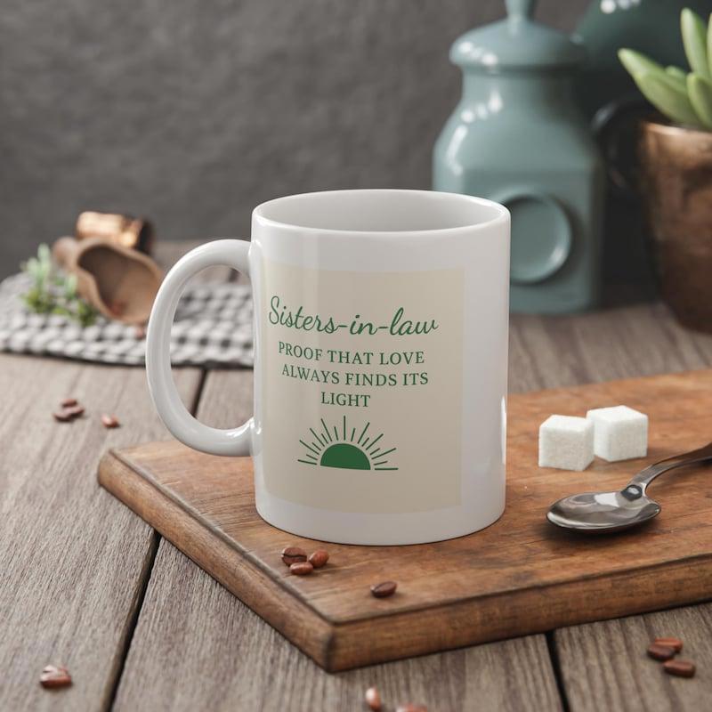 Tailorly White Ceramic 11 oz Mug - Sisters In Law Proof That Love Always Finds Its Light Minimalist Green Rising Sun Rays Glowing Above A Radiant Horizon Sun