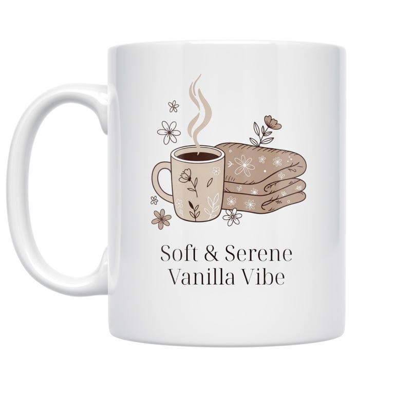 Tailorly White Ceramic 11 oz Mug - Soft Serene Vanilla Vibe Minimalist Cozy Illustration With Steaming Coffee And Folded Soft Patterned Blanket Cup