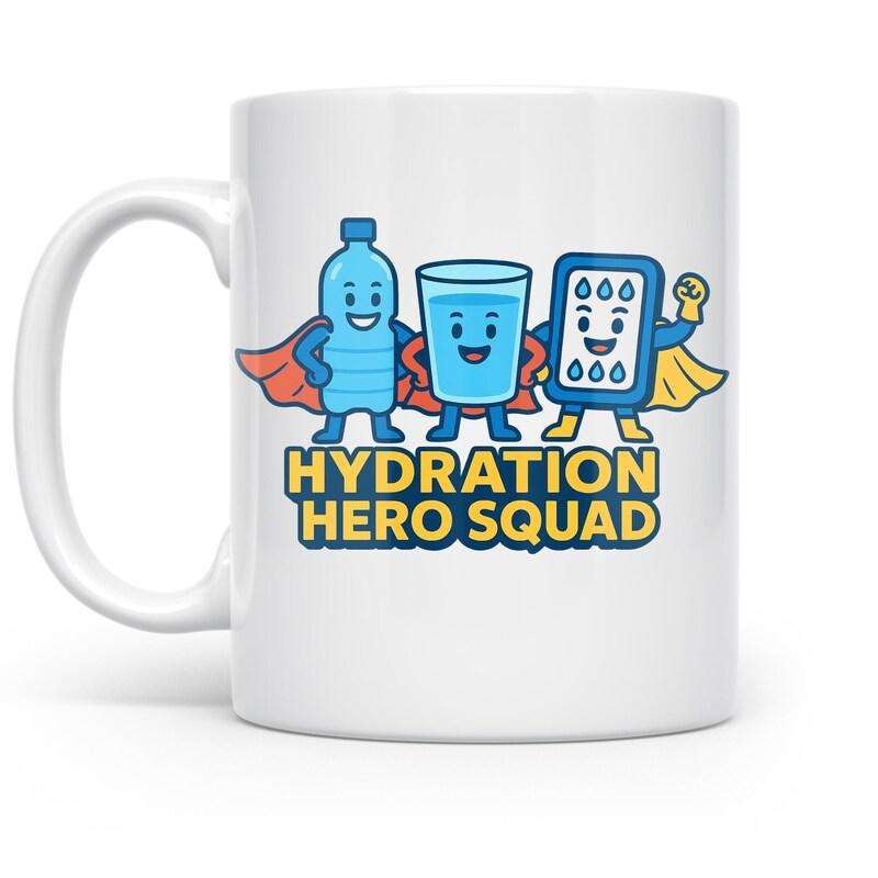 Tailorly White Ceramic 11 oz Mug - Hydration Hero Squad Three Animated Water Characters Wearing Colorful Capes Standing In A Row Squad
