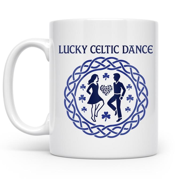 Tailorly White Ceramic 11 oz Mug - Lucky Celtic Dance Silhouette Dancers Inside Circular Knot Border With Small Lucky Shamrocks Mug
