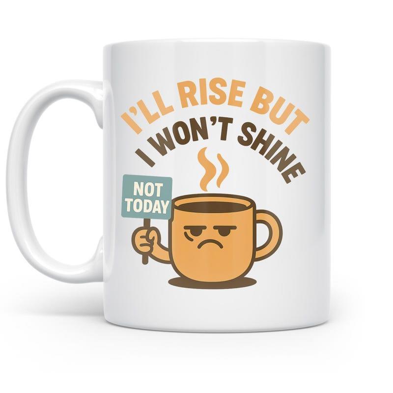 Tailorly White Ceramic 11 oz Mug - I'll Rise But I Won't Shine Not Today Grumpy Character Coffee Cup Holding A Small Sign Under Rising Steam Mug