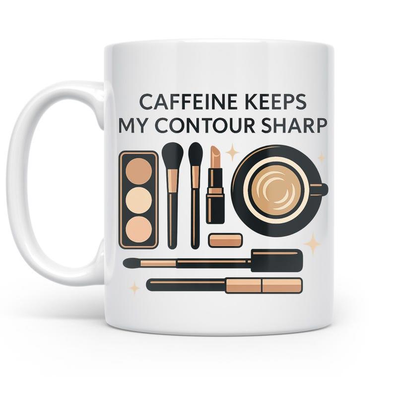 Tailorly White Ceramic 11 oz Mug - Caffeine Keeps My Contour Sharp Stylish Makeup Collection Resting Beside A Steaming Hot Coffee Mug