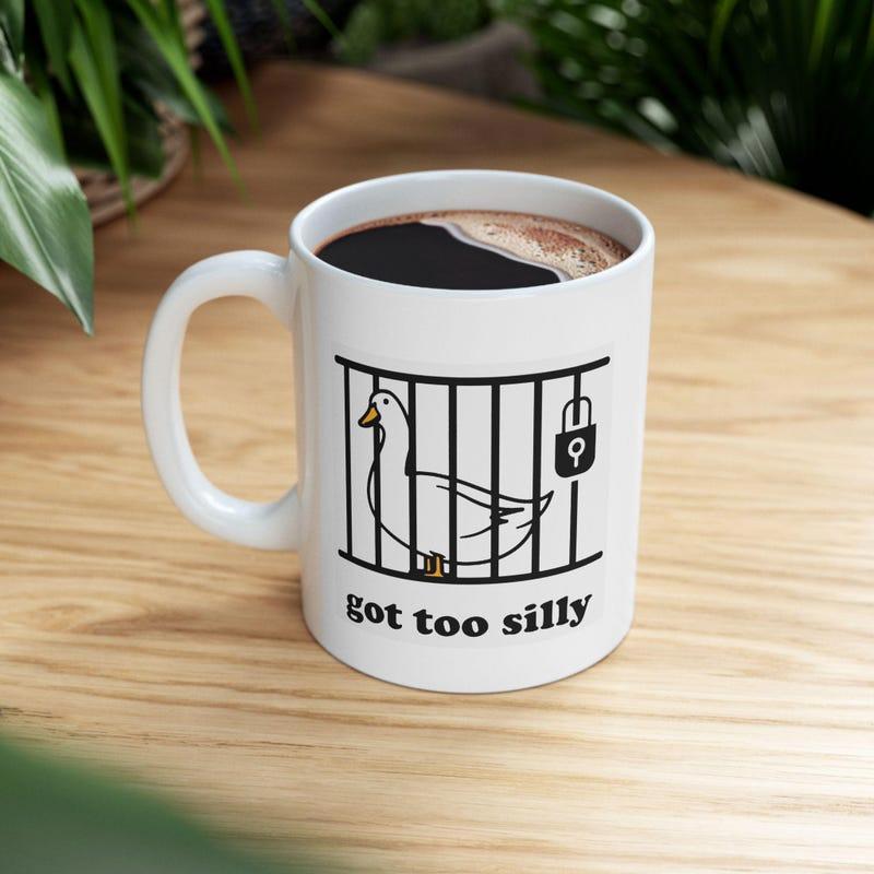 Tailorly White Ceramic 11 oz Mug - Got Too Silly Minimalist Black Line Drawing Of A Goose Inside A Cage Locked Goose