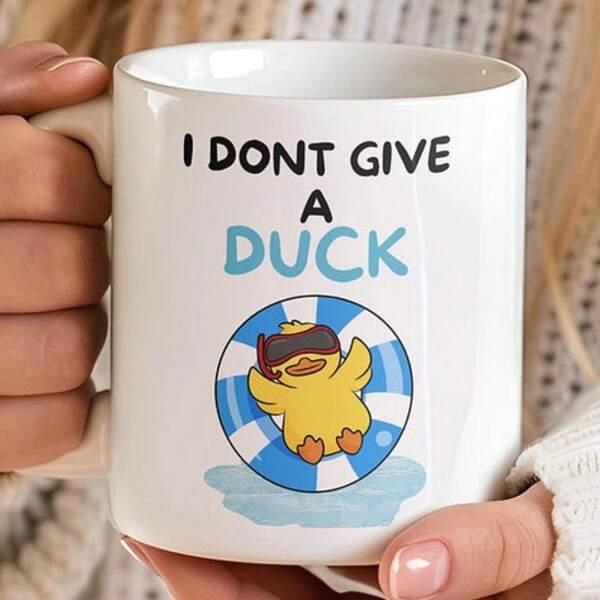 Tailorly White Ceramic 11 oz Mug - I Dont Give A Duck Cheerful Yellow Duckling Wearing Goggles Floating Inside A Striped Lifebuoy Duck