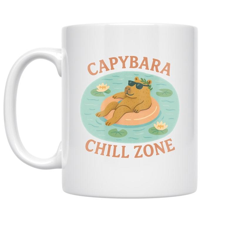 Tailorly White Ceramic 11 oz Mug - Capybara Chill Zone Cute Cartoon Animal Floating On An Orange Ring In A Serene Pond Capybara
