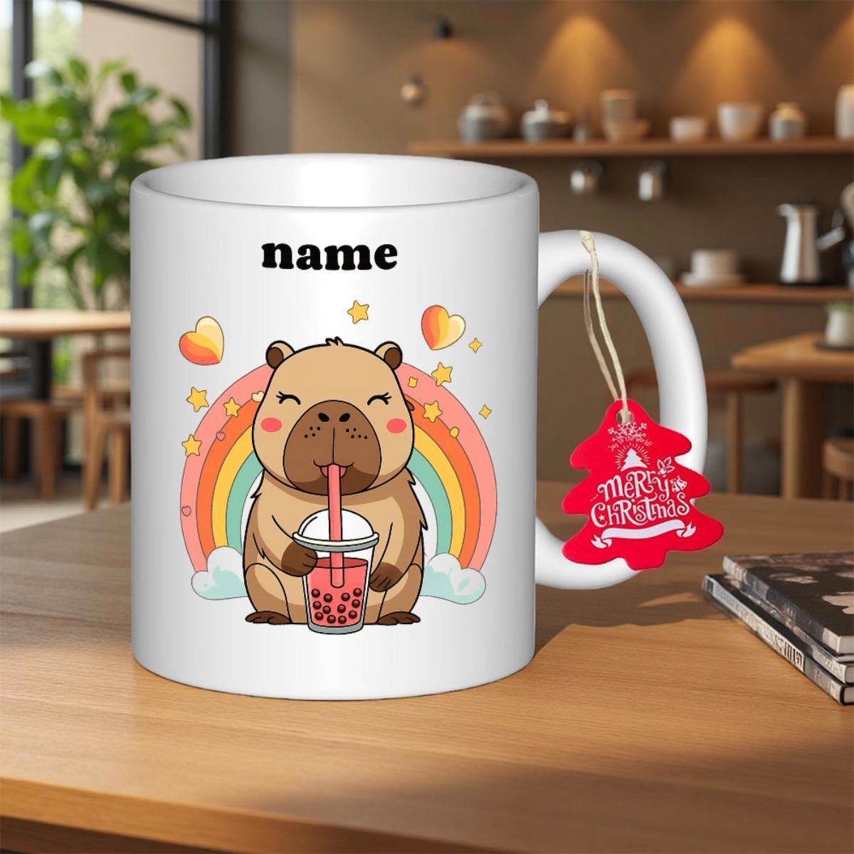 Tailorly White Ceramic 11 oz Mug - Name Merry Christmas Adorable Cartoon Animal Drinking Boba Tea Under Vibrant Rainbow Capybara