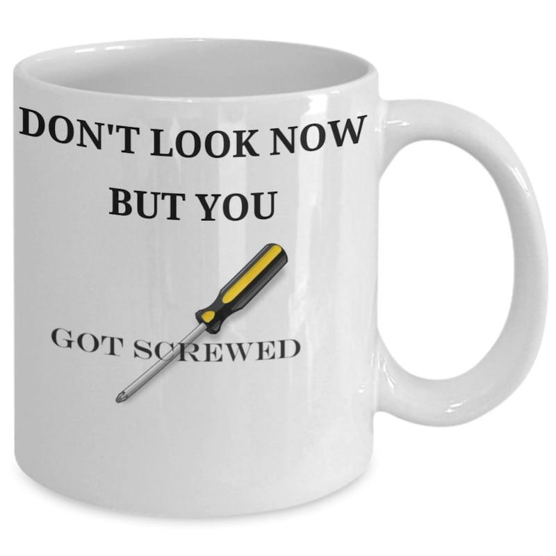 Tailorly White Ceramic 11 oz Mug - Don't Look Now But You Got Screwed Classic Yellow And Black Hand Tool Centered On A White Surface Screwdriver