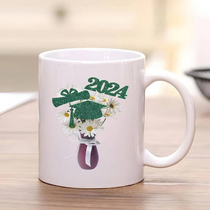 Tailorly White Ceramic 11 oz Mug - 2024 Green Graduation Cap Among White Daisies In Purple Decorative Vase Mug