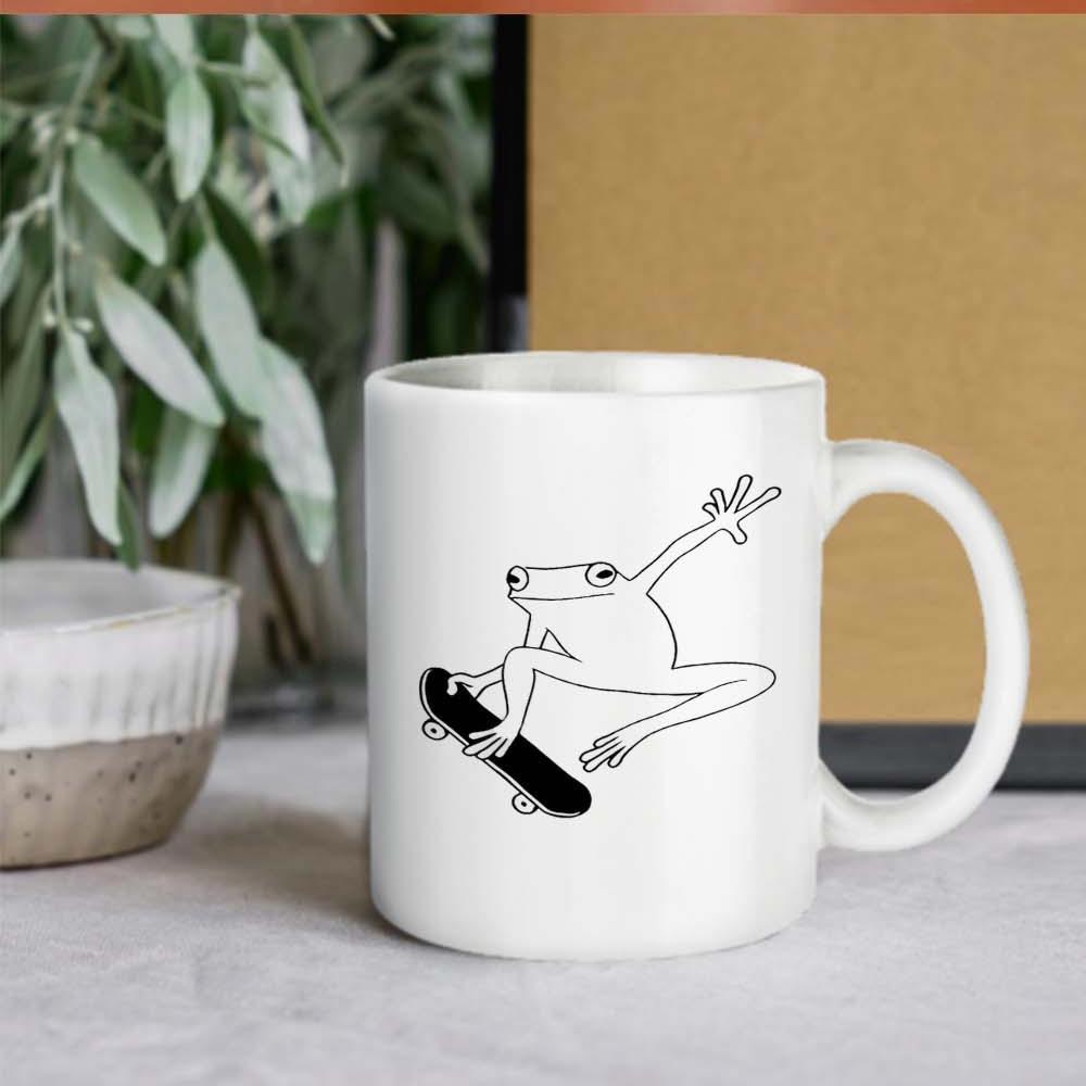 Tailorly White Ceramic 11 oz Mug - Minimalist Line Art Illustration Of A Playful Whimsical Skateboarding Frog