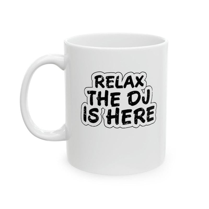 Tailorly White Ceramic 11 oz Mug - Relax The DJ Is Here Bold Black Hand Drawn Typography Featuring A Distinct White Outline Sign