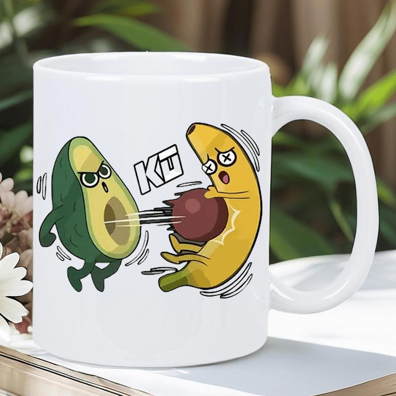 Tailorly White Ceramic 11 oz Mug - KU Funny Cartoon Avocado Throwing Seed At A Sad Injured Yellow Fruit