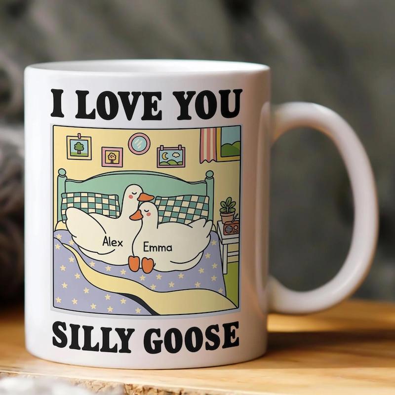 Tailorly White Ceramic 11 oz Mug - I Love You Silly Goose Alex Emma Two Charming White Ducks Resting Peacefully Inside A Cozy Cartoon Bed Goose