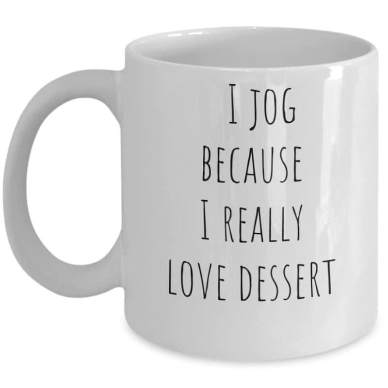Tailorly White Ceramic 11 oz Mug - I Jog Because I Really Love Dessert Minimalist Black Handwritten Typography Centered On A Ceramic Mug