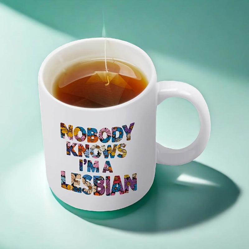 Tailorly White Ceramic 11 oz Mug - Nobody Knows I'm A Lesbian Elegant Floral Patterned Letters On Sleek White Ceramic Drinking Mug