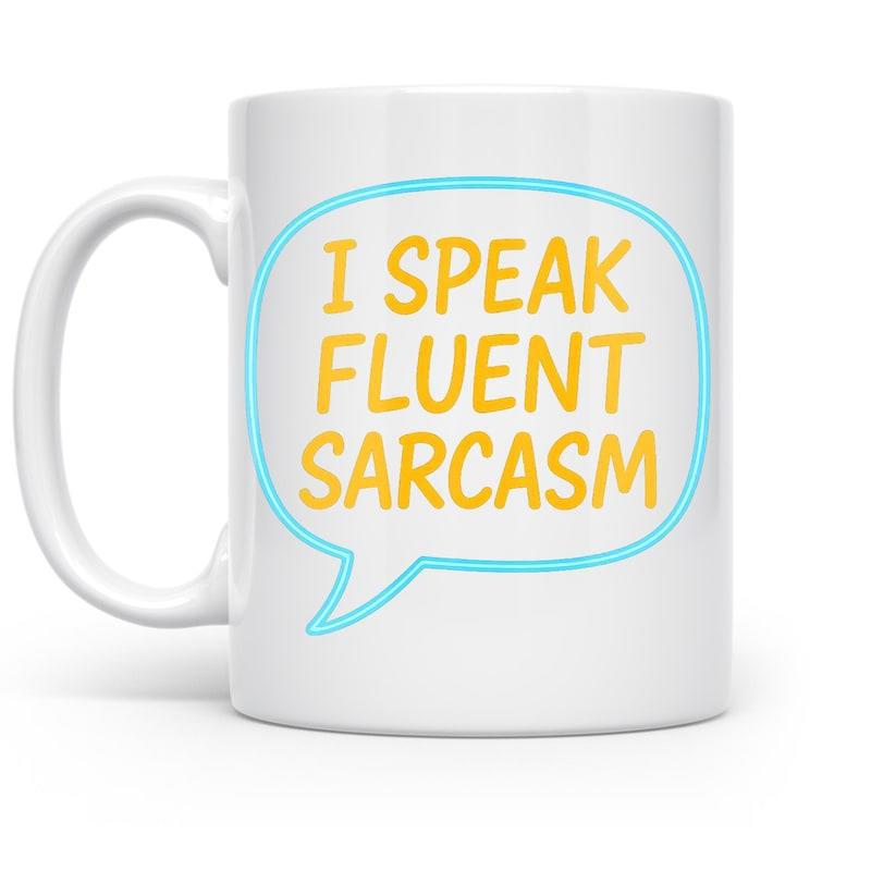 Tailorly White Ceramic 11 oz Mug - I Speak Fluent Sarcasm Vibrant Yellow Letters Contained Within A Simple Light Blue Outlined Comic Style Speech Bubble