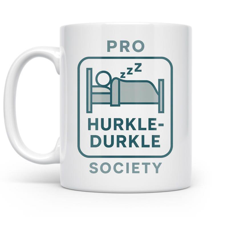 Tailorly White Ceramic 11 oz Mug - Pro Hurkle Durkle Society Minimalist Sleeping Figure Icon Resting Under Comfy Blanket Bed