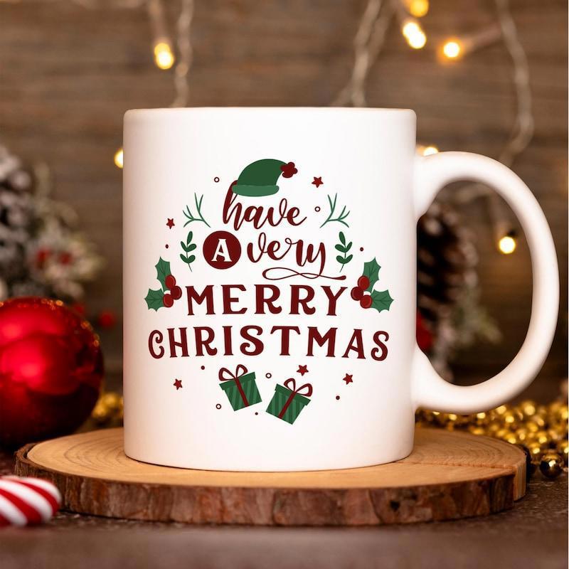 Tailorly White Ceramic 11 oz Mug - Have A Very Merry Christmas Festive Green Elf Hat With Holly Leaves And Wrapped Gift Boxes Mug