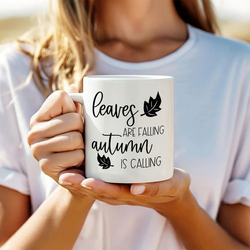 Tailorly White Ceramic 11 oz Mug - Leaves Are Falling Autumn Is Calling Two Simple Black Falling Leaves Silhouettes Set Against A Crisp White Background Leaf