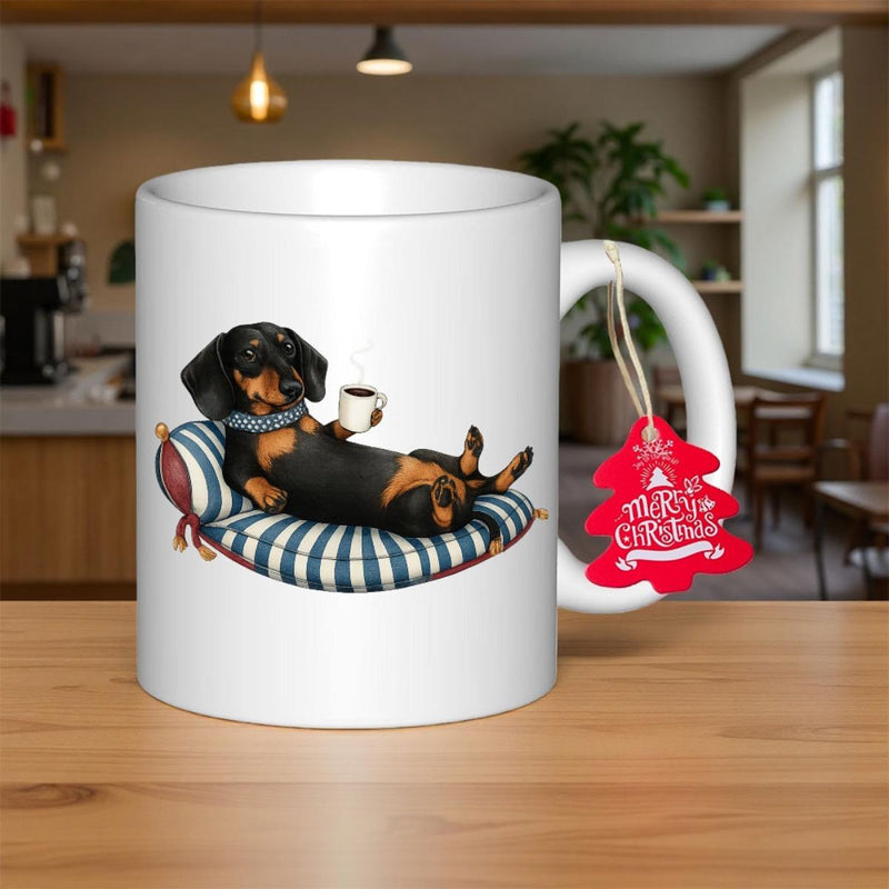 Tailorly White Ceramic 11 oz Mug - Merry Christmas Relaxing Puppy Lying On Striped Cushion Holding Coffee Cup Dachshund