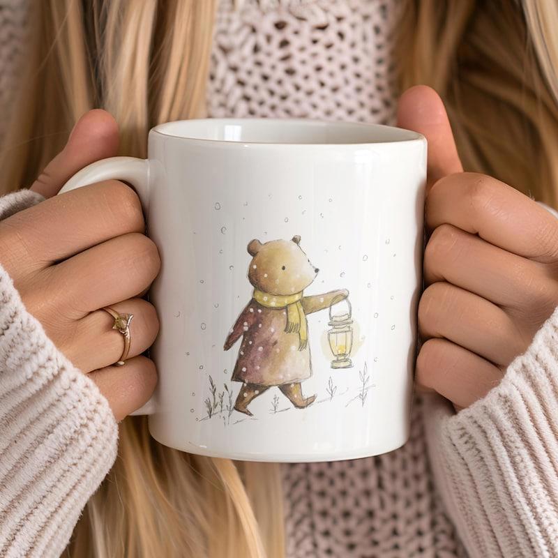 Tailorly White Ceramic 11 oz Mug - Hand Drawn Watercolor Animal Walking Through Winter Snow Holding A Small Lantern Bear