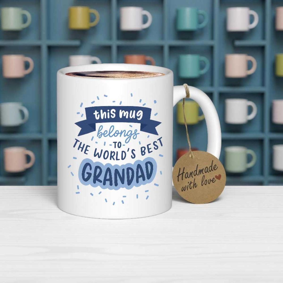 Tailorly White Ceramic 11 oz Mug - This Mug Belongs To The World's Best Grandad Decorative Navy Banner Surrounded By Artistic Script And Festive Blue Confetti Mug