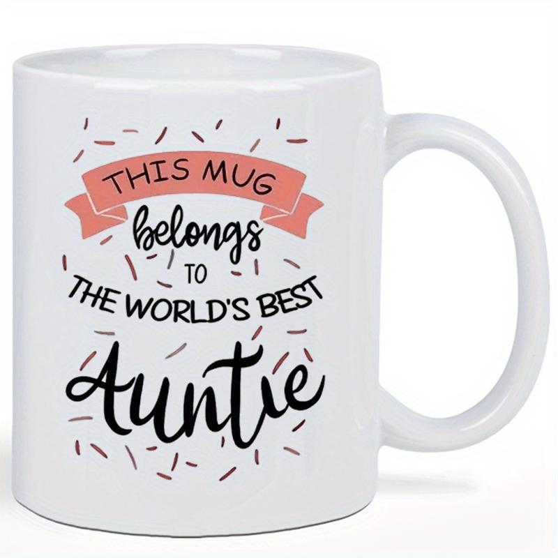 Tailorly White Ceramic 11 oz Mug - This Mug Belongs To The World's Best Auntie Decorative Pink Ribbon Banner With Festive Sprinkles And Calligraphy Mug