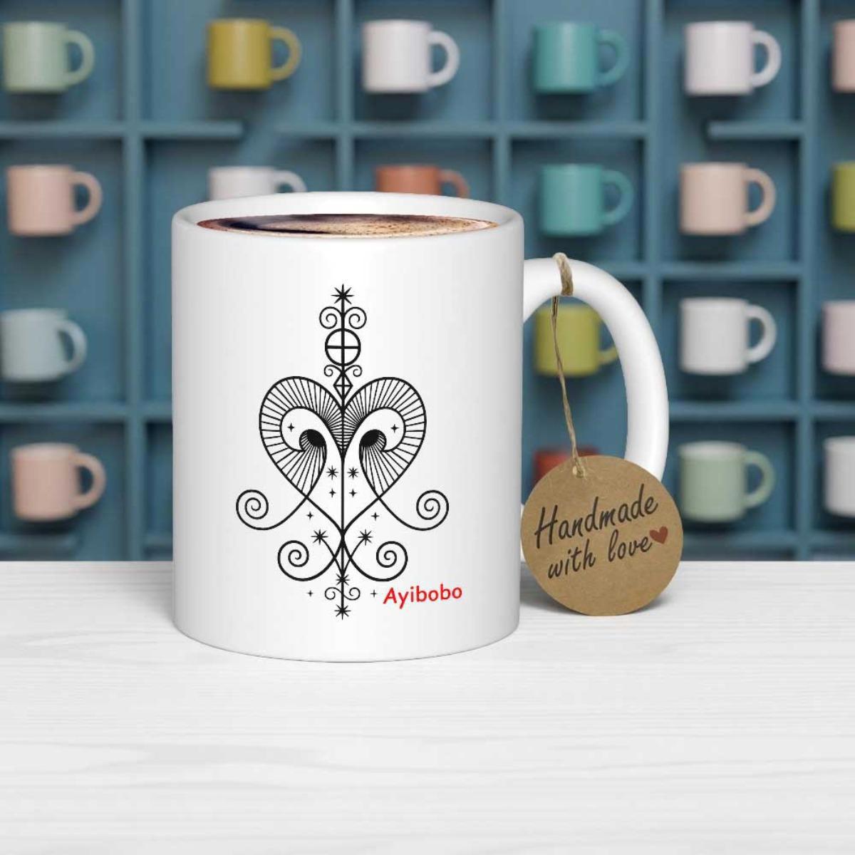 Tailorly White Ceramic 11 oz Mug - Ayibobo Handmade With Love Symmetrical Tribal Lines With Intricate Heart Swirls And Circular Accents Mug
