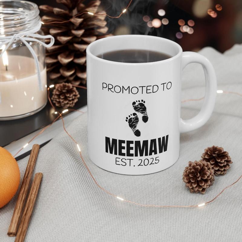 Tailorly White Ceramic 11 oz Mug - Promoted To Meemaw Est 2025 Minimalist Black Baby Prints Stamped On A Simple Footprints