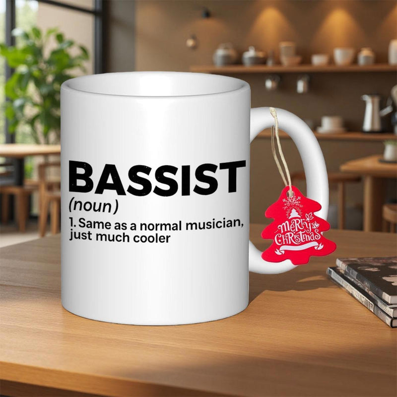 Tailorly White Ceramic 11 oz Mug - Bassist Noun 1 Same As A Normal Musician Just Much Cooler Minimalist White Ceramic Coffee Cup Resting Upon A Polished Wooden