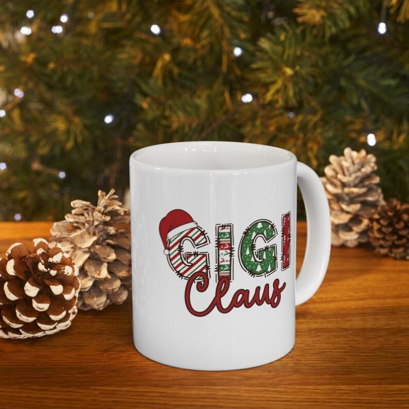 Tailorly White Ceramic 11 oz Mug - Gigi Claus Festive Decorative Letters Featuring A Red Santa Hat Mug