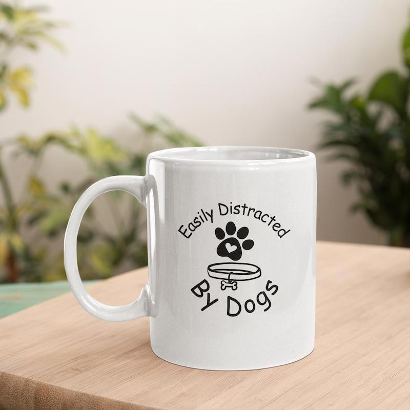 Tailorly White Ceramic 11 oz Mug - Easily Distracted By Dogs Minimalist Black Paw Print Featuring Heart Detail And Simple Dog Collar