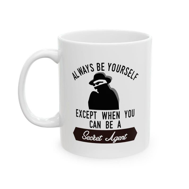 Tailorly White Ceramic 11 oz Mug - Always Be Yourself Except When You Can Be A Secret Agent Mysterious Silhouette Figure Wearing Dark Hat And Mask On Professional