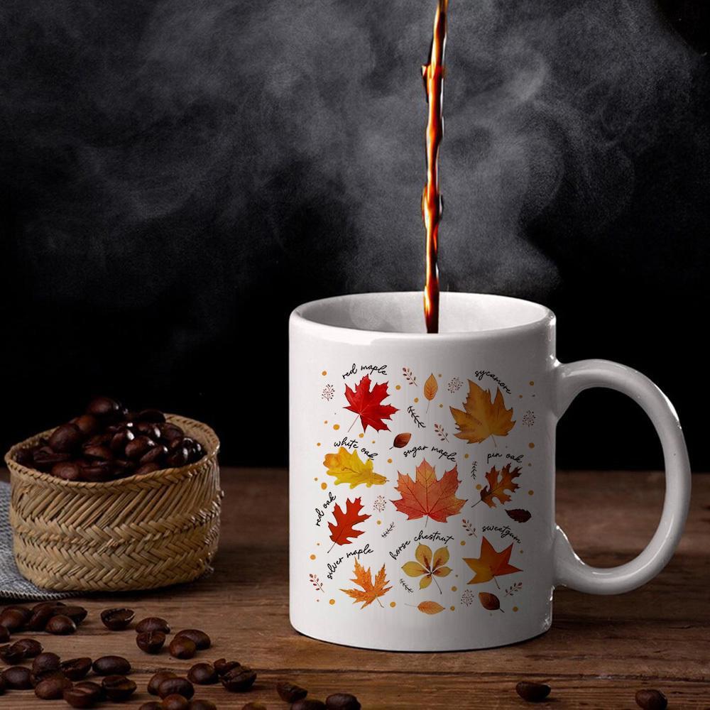 Tailorly White Ceramic 11 oz Mug - Vibrant Autumn Foliage Floating Gracefully In Warm Seasonal Tones Leaf