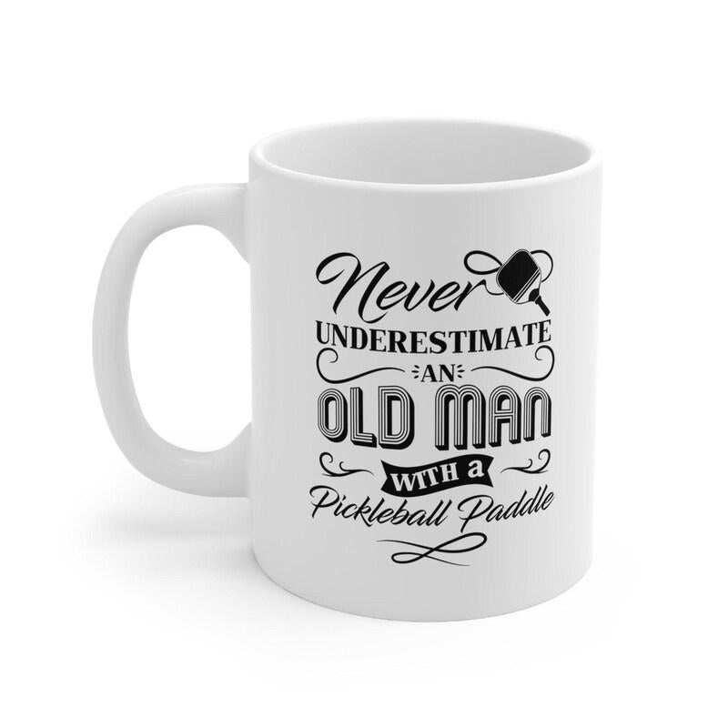 Tailorly White Ceramic 11 oz Mug - Never Underestimate An Old Man With A Pickleball Paddle Classic Athletic Themed Graphics Featuring Professional Sport Equipment