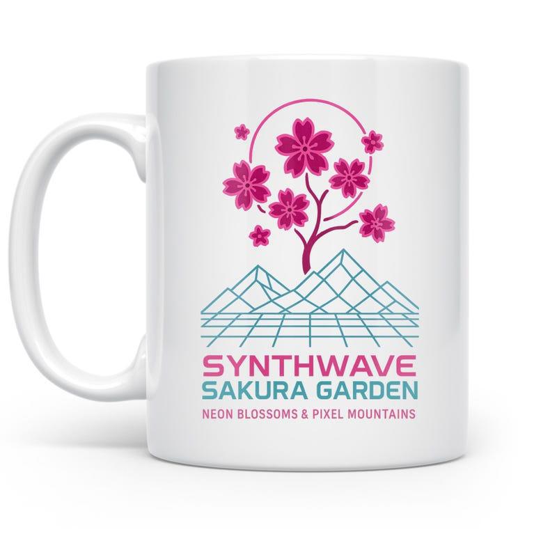 Tailorly White Ceramic 11 oz Mug - Synthwave Sakura Garden Neon Blossoms Pixel Mountains Vibrant Pink Blossoms Growing Above Blue Geometric Wireframe Grid Peaks