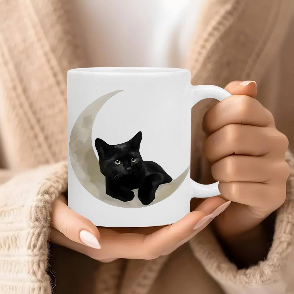Tailorly White Ceramic 11 oz Mug - Mysterious Black Kitten Sitting Peacefully Upon A Textured Crescent Moon Kitten
