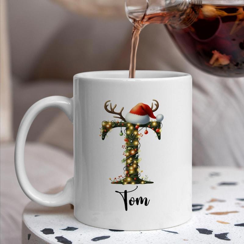 Tailorly White Ceramic 11 oz Mug - Tom Festive Christmas Letter Decorated With Antlers Lights And Santa Hat Initial