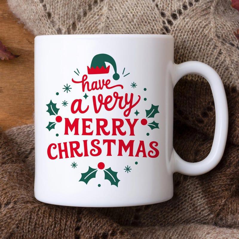 Tailorly White Ceramic 11 oz Mug - Have A Very Merry Christmas Festive Holiday Design With Green Elf Hat And Holly Leaf Decorated Mug