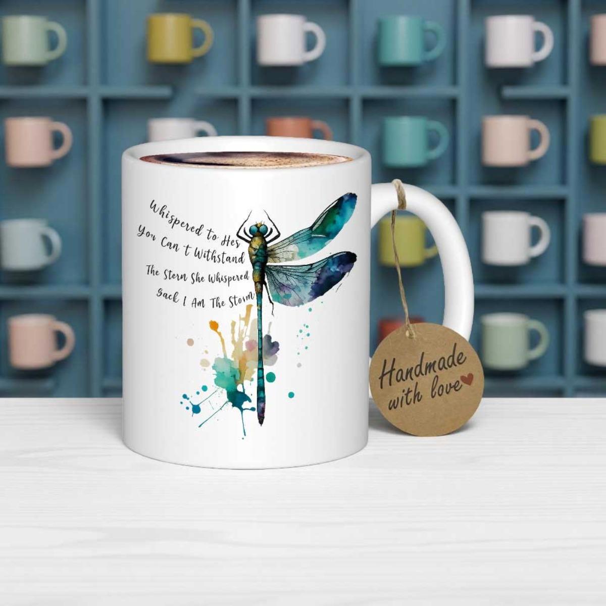 Tailorly White Ceramic 11 oz Mug - Whispered To Her You Cant Withstand The Storm She Whispered Back I Am The Storm Elegant Watercolor Wings Surrounded By Abstract