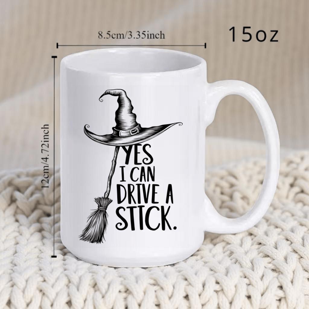 Tailorly White Ceramic 11 oz Mug - Yes I Can Drive A Stick Classic Pointed Witch Hat Resting Atop A Rustic Magic Wooden Broomstick