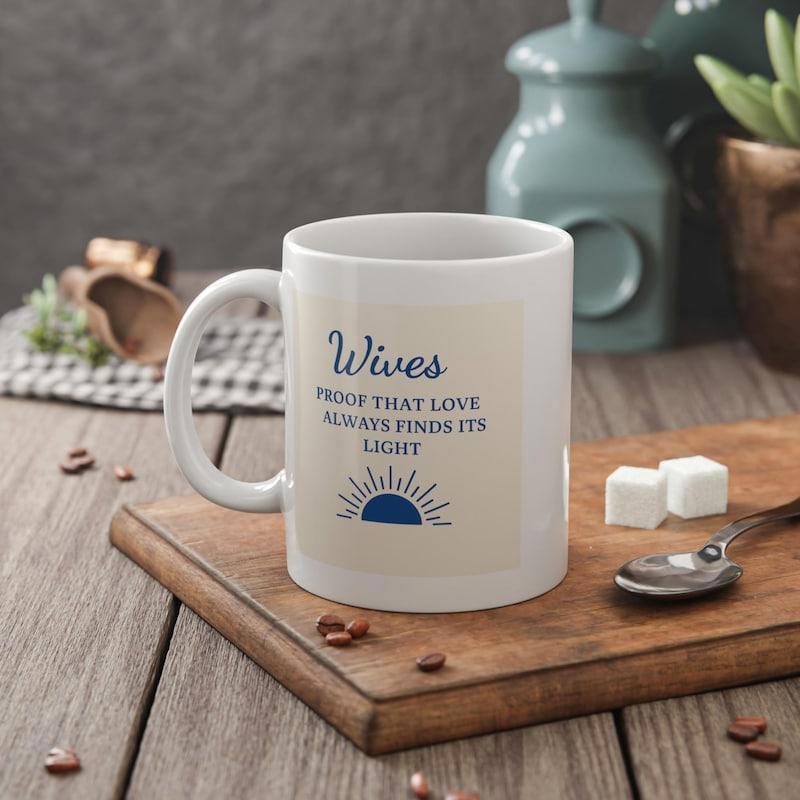 Tailorly White Ceramic 11 oz Mug - Wives Proof That Love Always Finds Its Light Simple Blue Rising Half Circle Under Radiant Beams Of Morning Light Sun